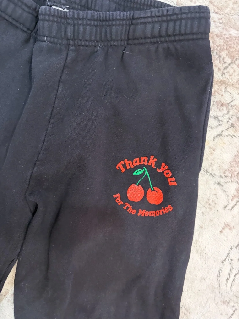 White Fox Boutique Black Sweatpants with Red Cherry Graphic